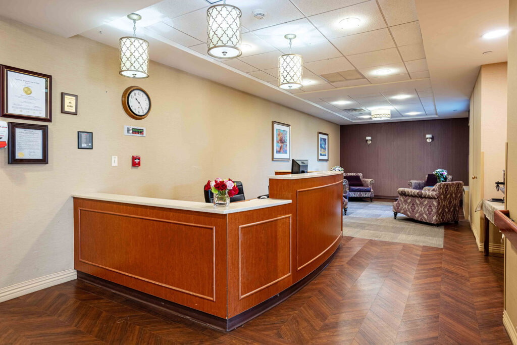 Celebrate Senior Living Niles front desk with comfortable waiting area.